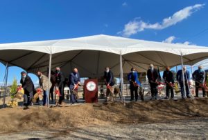 members of city council, county supervisor shovel dirt in groundbreaking at Landmark Square