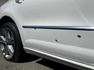 Photo of bullet holes into a vehicle