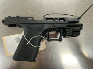 Evidence photo of gun collected from suspects.